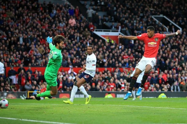 Rashford opened fire, MU ended Liverpool's winning streak 4